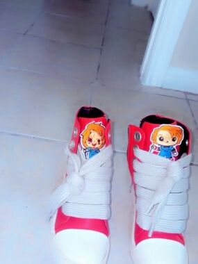 Red High-Top Sneakers with Cartoon Character